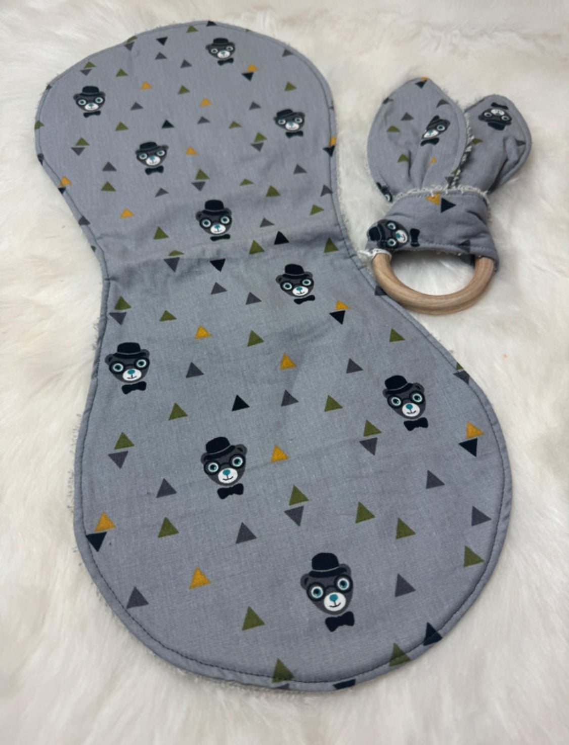 BAVOIR D'EPAULE ET ANNEAUX DE DENTITION