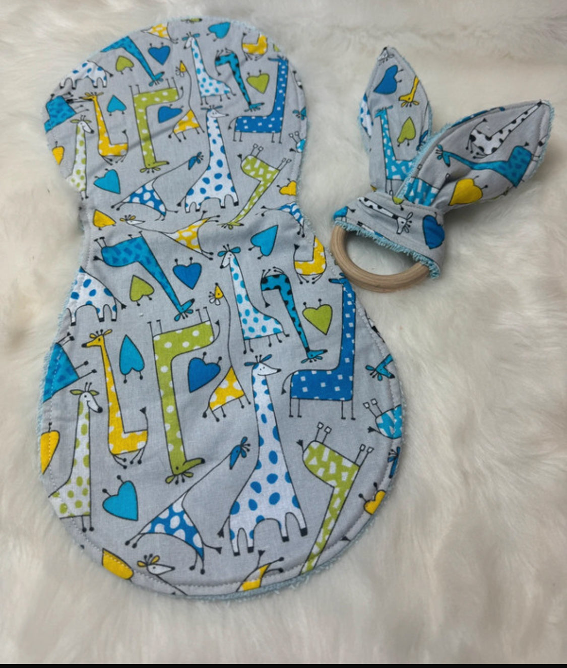 BAVOIR D'EPAULE ET ANNEAUX DE DENTITION